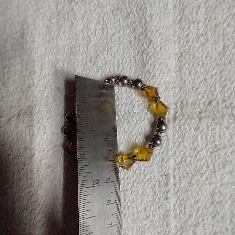 Silvertone yellow faceted beaded very small bracelet